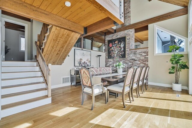 17 Wagon Wheel Rd, Winchester, MA 01890 - dining room featuring stairway, beamed ceiling, baseboards, and plenty of natural light