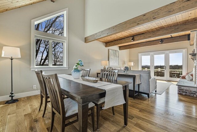 17 Wagon Wheel Rd, Winchester, MA 01890 - dining space with wooden ceiling with exposed beams, wood finished floors, and baseboards