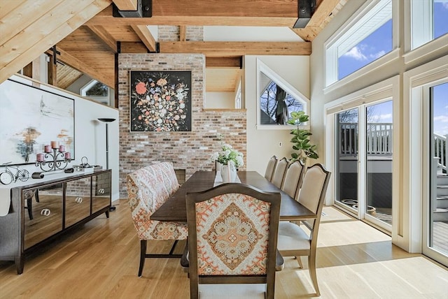 17 Wagon Wheel Rd, Winchester, MA 01890 - dining space featuring wood finished floors, a towering ceiling, and beam ceiling