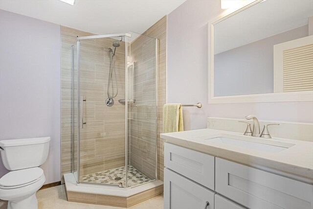 17 Wagon Wheel Rd, Winchester, MA 01890 - bathroom featuring toilet, vanity, and a stall shower