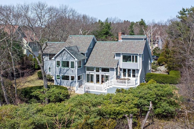 17 Wagon Wheel Rd, Winchester, MA 01890 - back of property with a chimney
