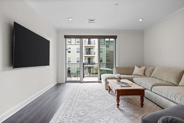 69 Foundry St Unit 305, Wakefield, MA 01880 - living area featuring wood finished floors, ornamental molding, and recessed lighting