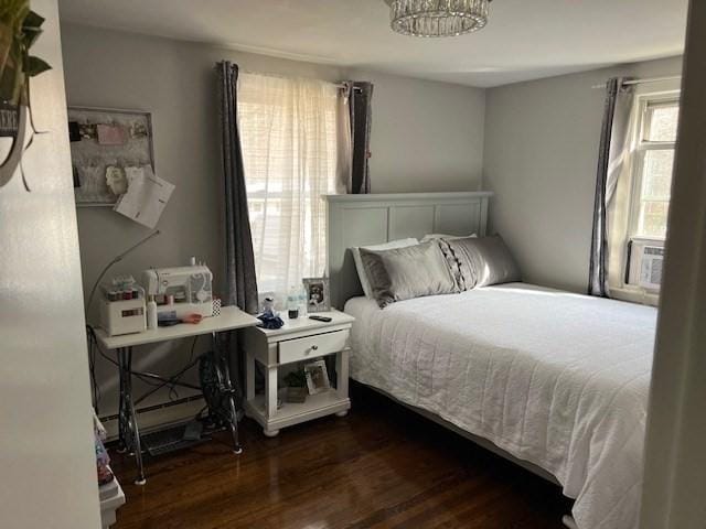 bedroom featuring wood finished floors