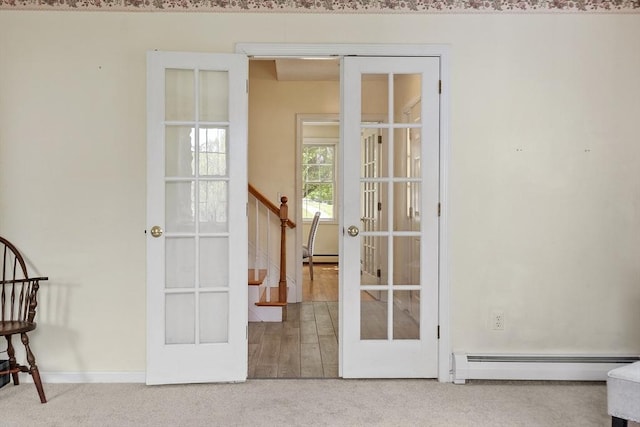 4 Quail Run Dr, Methuen, MA 01844 - spare room featuring a baseboard radiator, french doors, carpet, baseboard heating, and baseboards