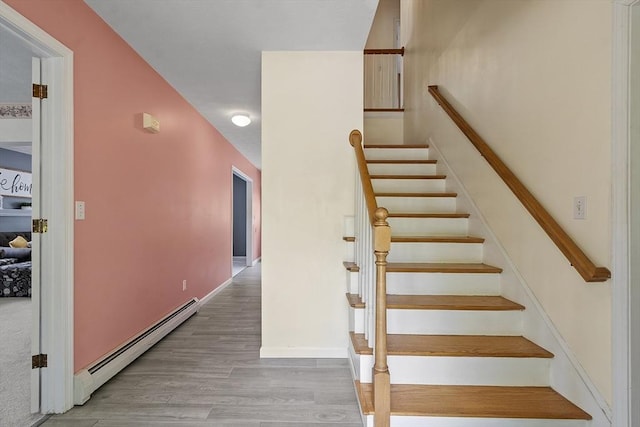 4 Quail Run Dr, Methuen, MA 01844 - staircase with a baseboard radiator and wood finished floors