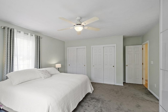4 Quail Run Dr, Methuen, MA 01844 - carpeted bedroom with two closets, a ceiling fan, and baseboards