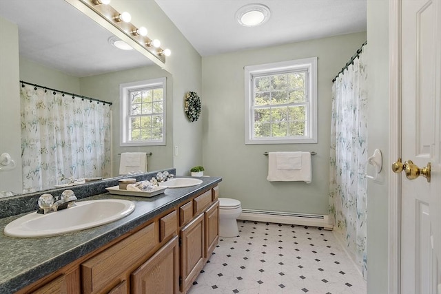 4 Quail Run Dr, Methuen, MA 01844 - bathroom with a baseboard heating unit, tile patterned floors, toilet, double vanity, and curtained shower