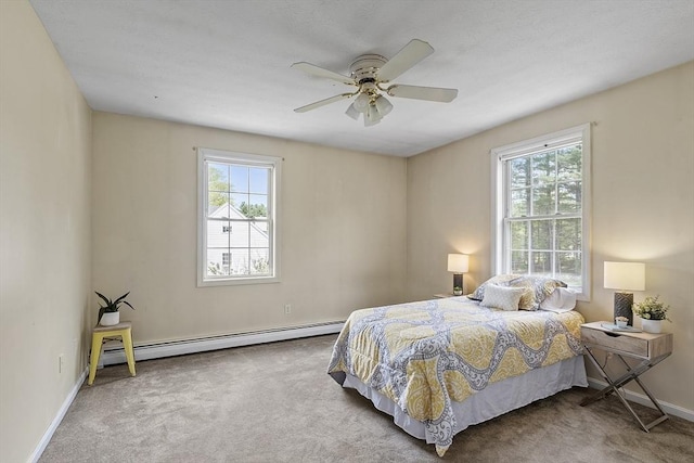 4 Quail Run Dr, Methuen, MA 01844 - bedroom with baseboard heating, carpet floors, baseboards, and ceiling fan
