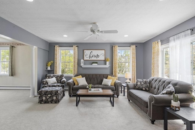 4 Quail Run Dr, Methuen, MA 01844 - living area featuring a baseboard heating unit, plenty of natural light, carpet flooring, baseboard heating, and recessed lighting