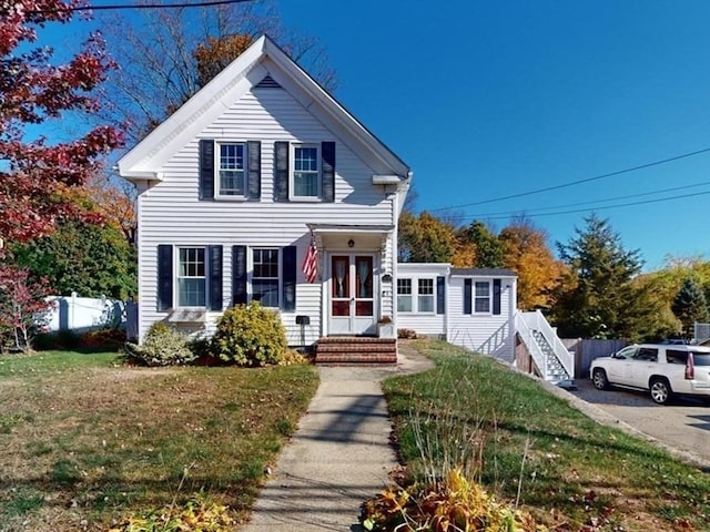 view of front of home with a front yard