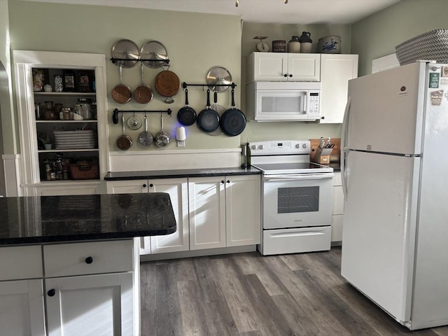 kitchen featuring white cabinetry, white appliances, and dark wood-type flooring