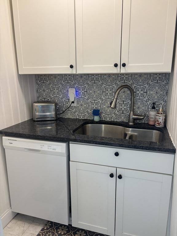 kitchen featuring white cabinetry, dishwasher, and sink