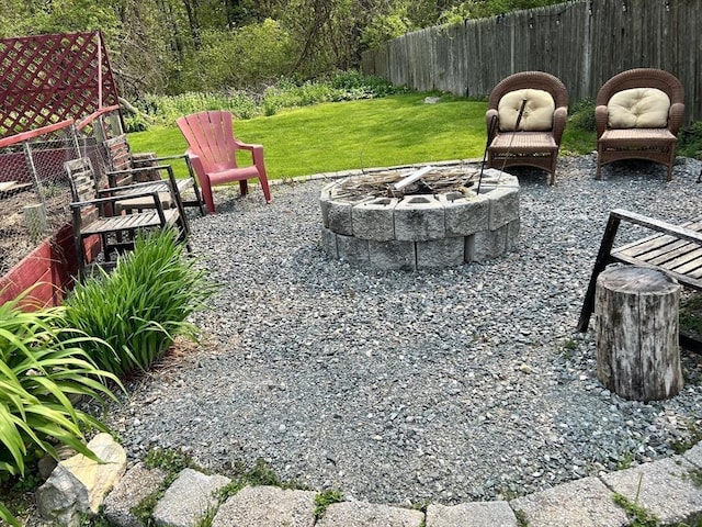 view of yard with a patio area and a fire pit