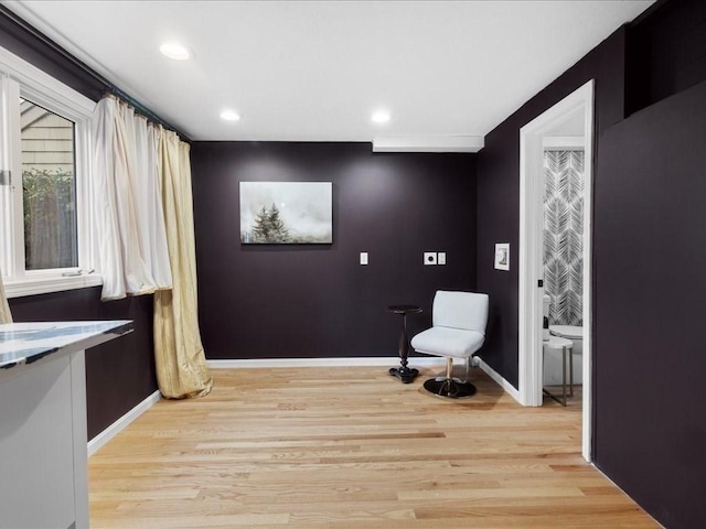 sitting room featuring light hardwood / wood-style floors