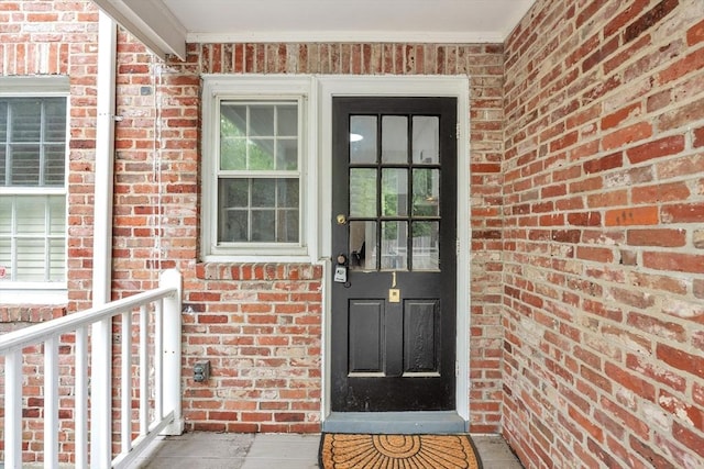 7 Hammond Pond Pkwy Unit 1, Newton, MA 02467 - doorway to property featuring brick siding