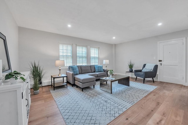 7 Hammond Pond Pkwy Unit 1, Newton, MA 02467 - living area with light wood-type flooring, recessed lighting, and baseboards