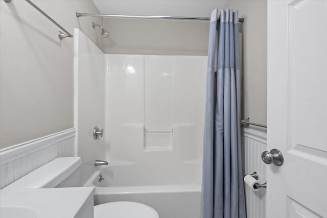 859 Pleasant St, Canton, MA 02021 - bathroom featuring vanity, shower / bathtub combination with curtain, wainscoting, and toilet