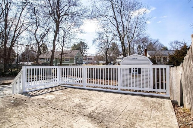 859 Pleasant St, Canton, MA 02021 - view of patio / terrace with an outbuilding, fence private yard, and a shed
