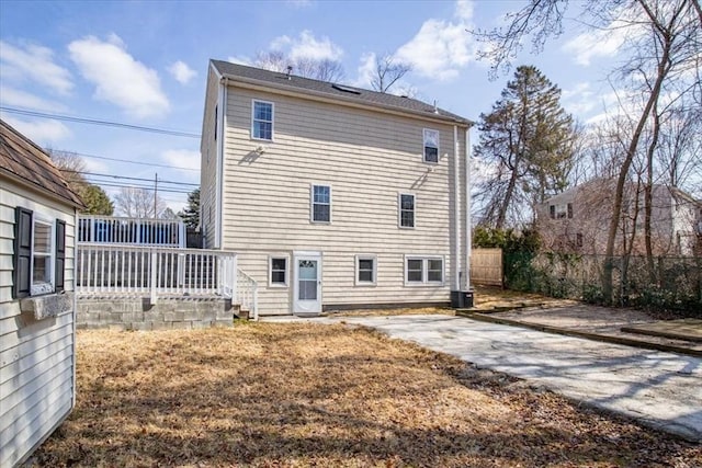 859 Pleasant St, Canton, MA 02021 - rear view of house with fence