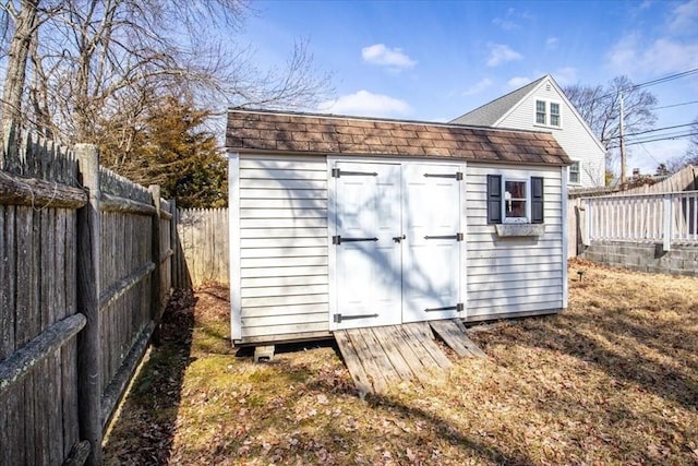 859 Pleasant St, Canton, MA 02021 - view of shed featuring a fenced backyard