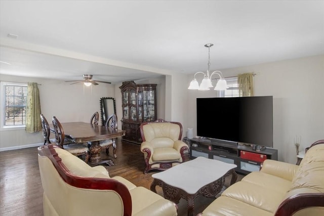 859 Pleasant St, Canton, MA 02021 - living room featuring baseboards, plenty of natural light, wood finished floors, and ceiling fan with notable chandelier