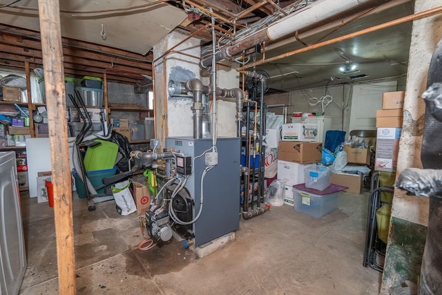 unfinished below grade area featuring a heating unit