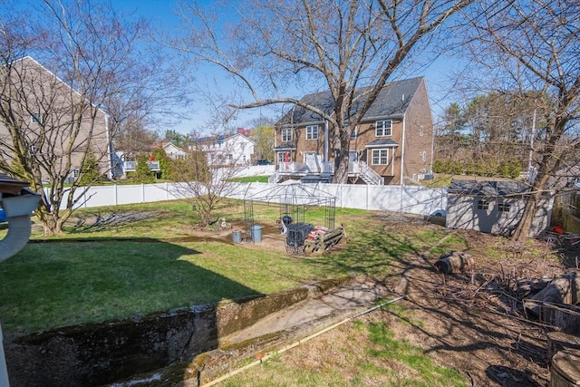 view of yard featuring a fenced backyard