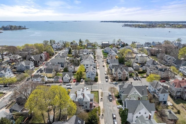 bird's eye view featuring a residential view and a water view