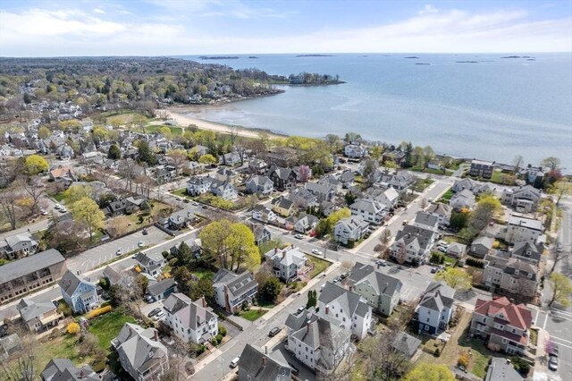 aerial view featuring a residential view and a water view