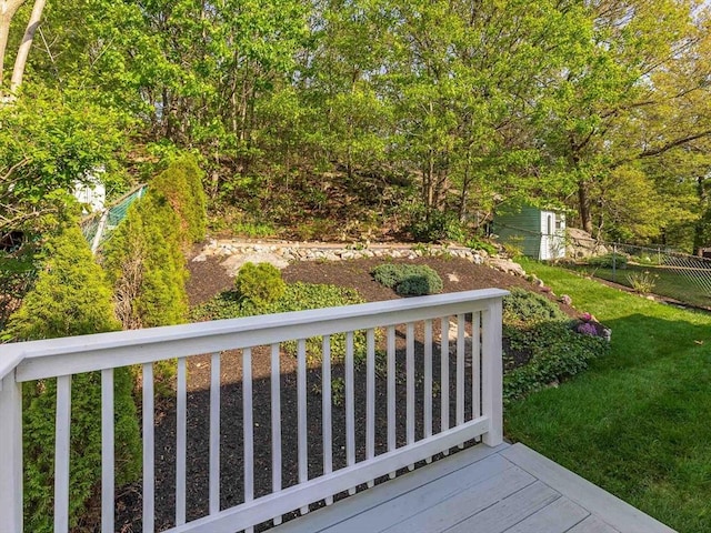 wooden deck featuring an outdoor structure