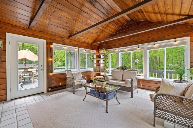 16 Gilbert Way, Millbury, MA 01527 - sunroom with wooden ceiling, wooden walls, and tile patterned floors