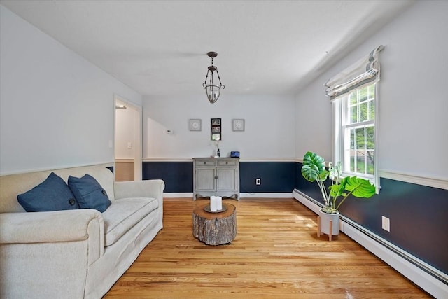 16 Gilbert Way, Millbury, MA 01527 - sitting room featuring light wood-style floors, baseboards, and baseboard heating