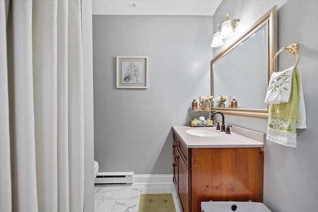 16 Gilbert Way, Millbury, MA 01527 - bathroom with a baseboard heating unit, marble finish floors, vanity, toilet, and baseboards