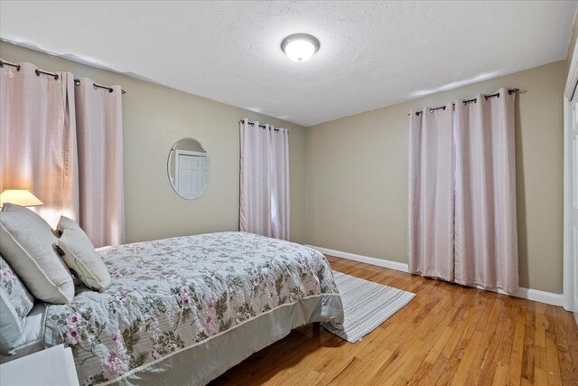 16 Gilbert Way, Millbury, MA 01527 - bedroom with baseboards and wood finished floors