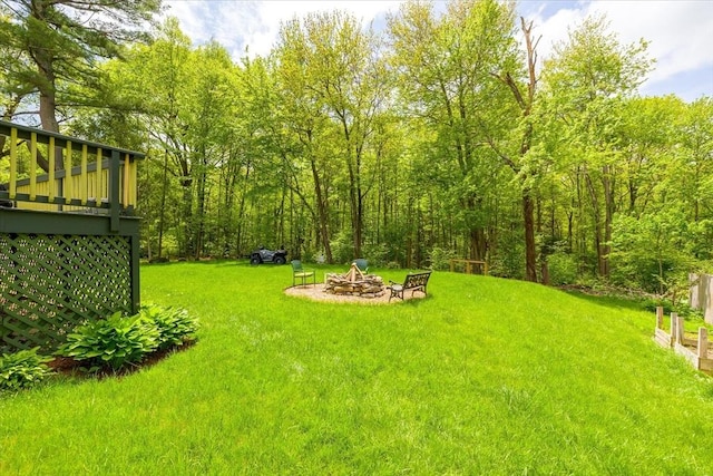 16 Gilbert Way, Millbury, MA 01527 - view of grassy yard featuring a fire pit
