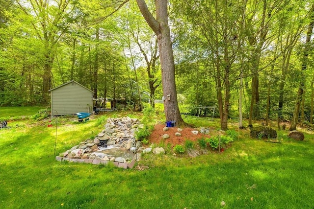 16 Gilbert Way, Millbury, MA 01527 - view of green lawn with a view of trees