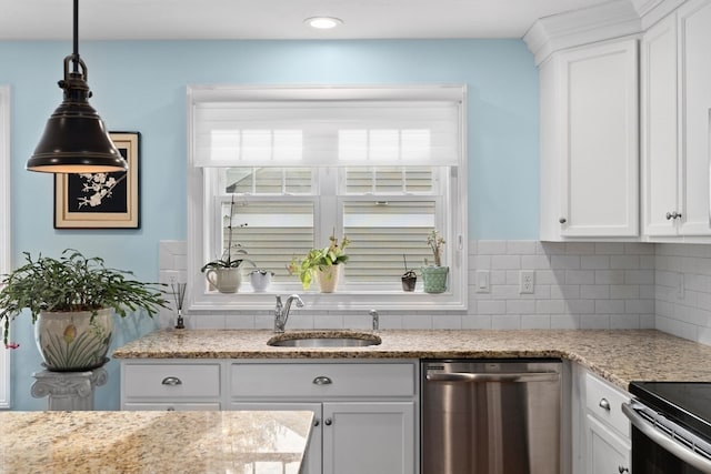 kitchen featuring dishwasher, tasteful backsplash, white cabinetry, and sink