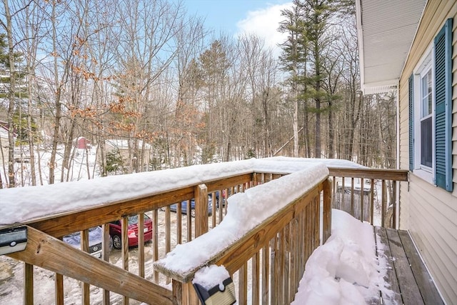 view of snow covered deck