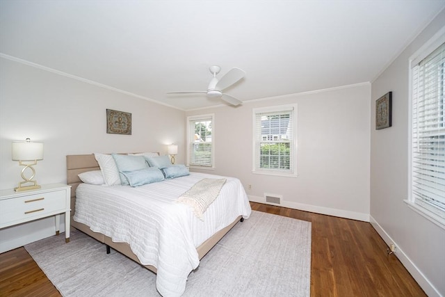 6 Gilbert Rd, Natick, MA 01760 - bedroom with wood finished floors, ornamental molding, baseboards, and a ceiling fan