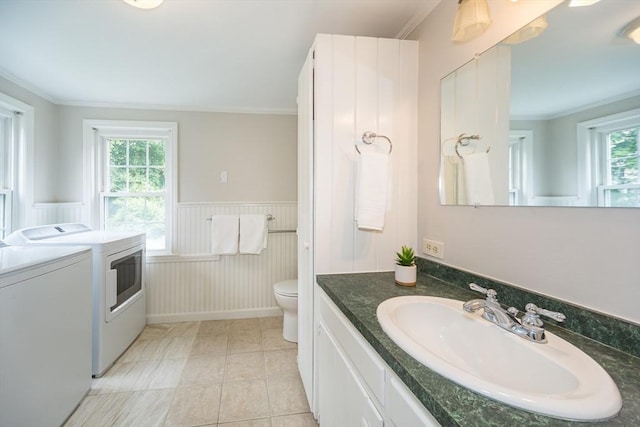 6 Gilbert Rd, Natick, MA 01760 - bathroom with separate washer and dryer, plenty of natural light, vanity, ornamental molding, and toilet