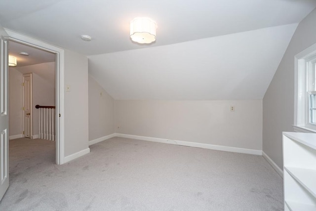 6 Gilbert Rd, Natick, MA 01760 - bonus room with vaulted ceiling, light colored carpet, and baseboards
