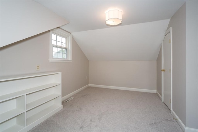 6 Gilbert Rd, Natick, MA 01760 - additional living space featuring carpet floors, lofted ceiling, and baseboards