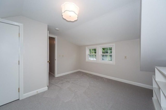 6 Gilbert Rd, Natick, MA 01760 - additional living space featuring vaulted ceiling, carpet floors, and baseboards