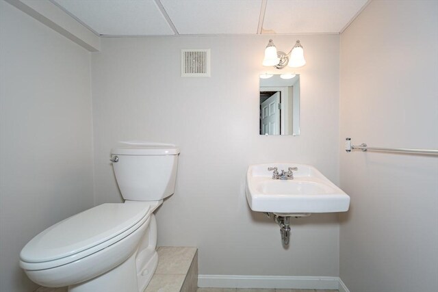 6 Gilbert Rd, Natick, MA 01760 - half bath featuring toilet, a sink, and baseboards