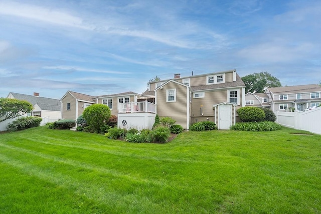 6 Gilbert Rd, Natick, MA 01760 - rear view of property featuring a chimney