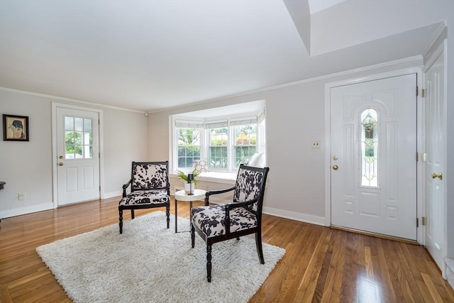 6 Gilbert Rd, Natick, MA 01760 - entrance foyer with wood finished floors, crown molding, and baseboards
