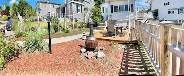 14 Pequot Rd, Weymouth, MA 02191 - surrounding community with a wooden deck and a residential view