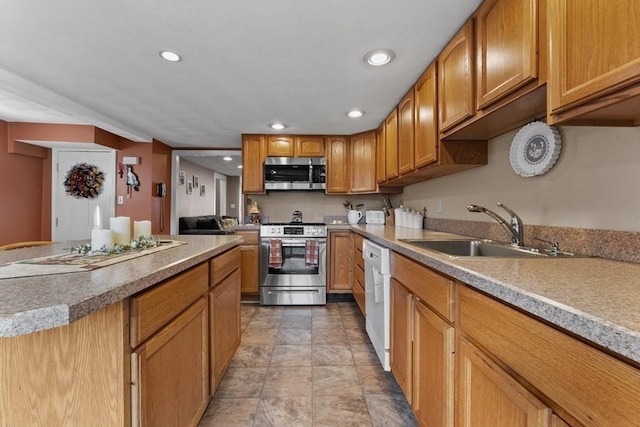 kitchen featuring stainless steel appliances and sink