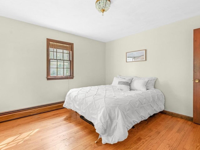 1 Winter Dr, Seekonk, MA 02771 - bedroom featuring light wood finished floors and a baseboard radiator