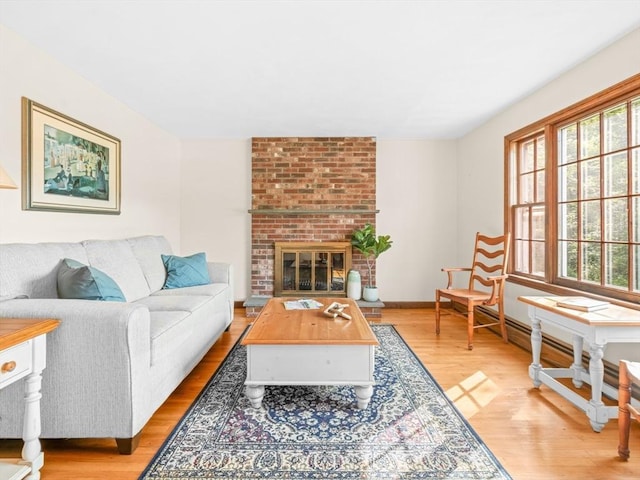 1 Winter Dr, Seekonk, MA 02771 - living area featuring healthy amount of natural light, light wood-style flooring, and a fireplace